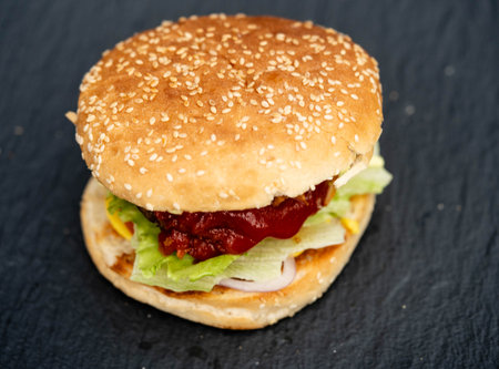 grilled burgers from the charcoal grillの写真素材