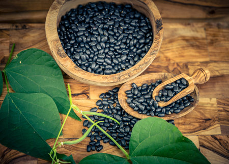 dried legumes on olive wood