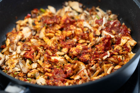 chicken breast fillet with chili sauceの写真素材