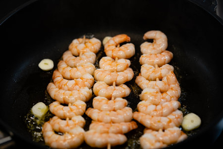 delicious shrimps with herbs and spicesの写真素材