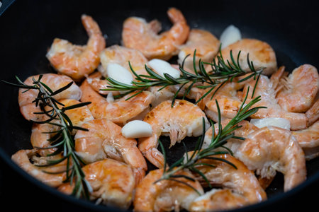 delicious shrimps with herbs and spicesの写真素材