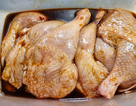 roasted chicken drumsticks with oven vegetablesの写真素材