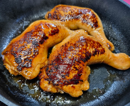 roasted chicken drumsticks with oven vegetablesの写真素材