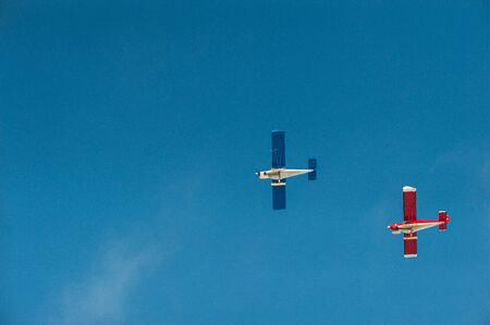 plane flight against the blue skyの写真素材