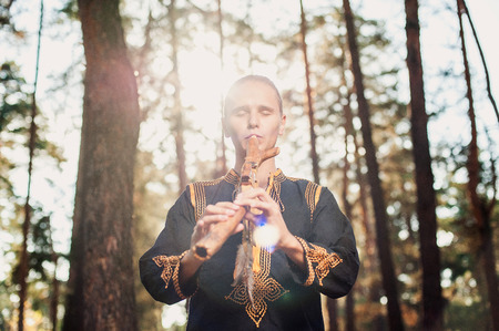 ethnic music, ethnic musician, musician, meditation, wooden musical instruments, the guy playing the ethnic musical instrumentsの写真素材