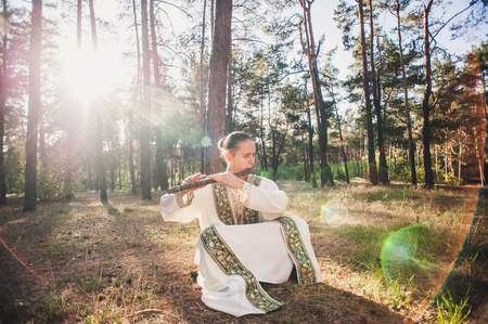 ethnic music, ethnic musician, musician, meditation, wooden musical instruments, the guy playing the ethnic musical instrumentsの写真素材