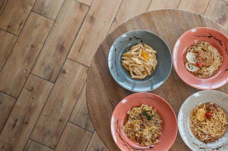 Traditional chinese food, Spaghetti with egg on wooden table.の写真素材
