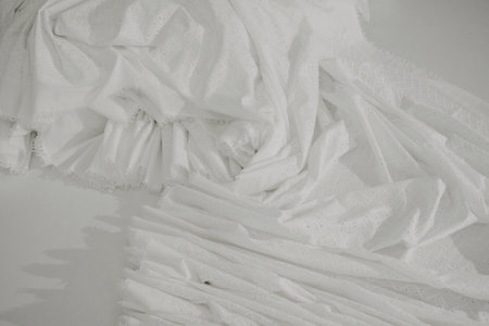 Crumpled white fabric texture. Abstract background and texture for design.