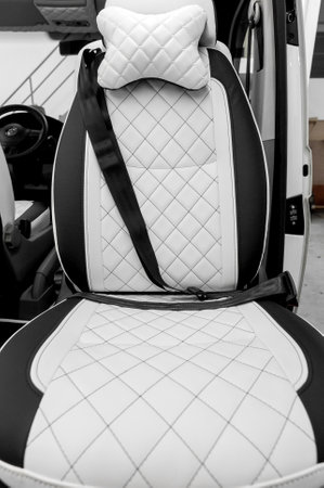 Comfortable interior of a passenger bus with soft seats. The design is made to order. Private covering of cars. Various elements of the bus interior.の写真素材