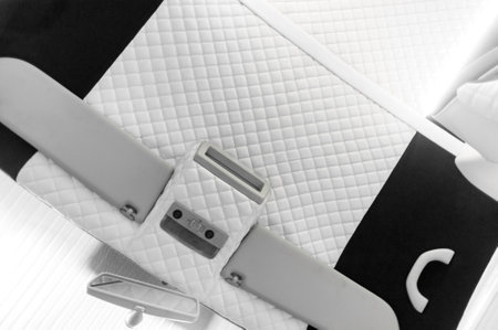 Comfortable interior of a passenger bus with soft seats. The design is made to order. Private...