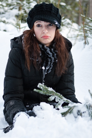 Young woman in a winter landscapeの写真素材