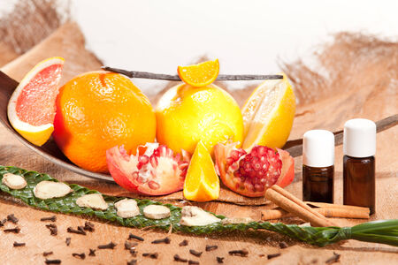 Composition with citrus spices and pomegranate seedsの写真素材