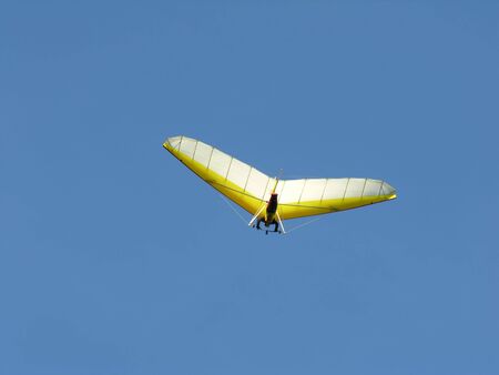 Soaring hang gliderの写真素材