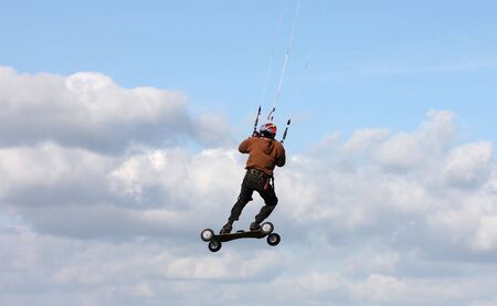 Kite boarder on Westbury White Horse Wiltshire Engliand with room for text