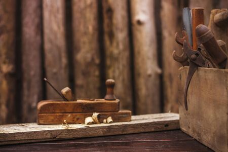 old planer and a box of toolsの写真素材