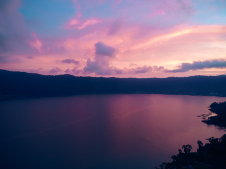 beautiful pink sunset in the Bay on the background of mountains, top view.の写真素材