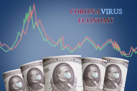 Banknotes with the image of the President in a medical mask and a diagram on a blue background. The inscription Corona virus economy. The concept of the financial crisis, and viral pandemics.の写真素材