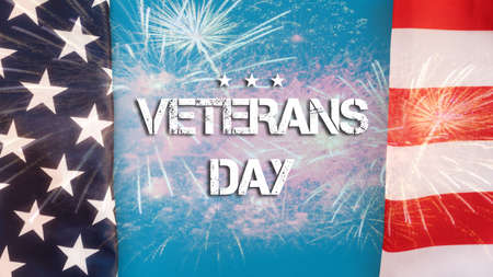 National holidays of the USA. Blue background framed with an American flag and fireworks. Flat lay. The concept of the Veterans Day.の写真素材