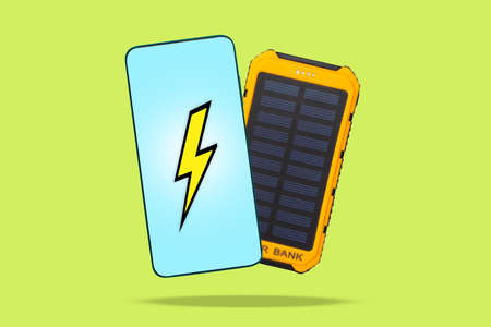 A smartphone with a lighting and a portable charger on a vivid light green background. Concept of...