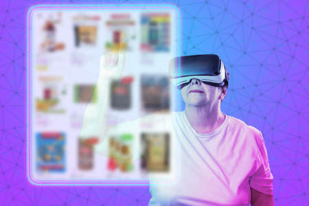Portrait of elderly woman in VR glasses choice food at internet shop, point at digital screen. Purple gradient background with mesh. The concept of virtual reality, metaverse and online shopping.の写真素材