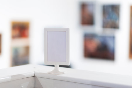 education in museum. White frame with mockup and copy space on background of art gallery in defocused. advertising and business.の写真素材
