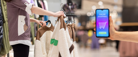 Web banner of marketing and advertising. Close-up of woman's hand showing smartphone with purchases...