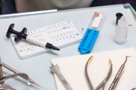 Close-up of medical dental instruments lying on table. Concept of dentistry and teeth treatment.の写真素材