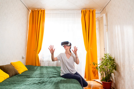 Female fully immersed in digital reality using VR headset, engaging in a futuristic adventure,...