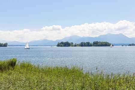 Lake Chiemsee, Bavaria, Germany - August 7th, 2016. View to Krautinsel, a small island in Lake Chiemsee.のeditorial素材