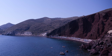 view from Santorini, Greece - sun, blue sky, sea and rocksの写真素材
