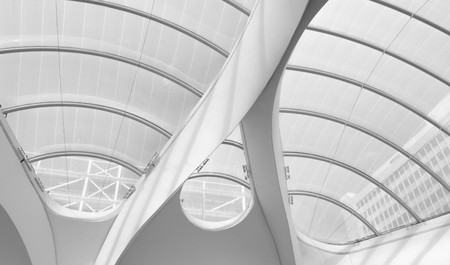 Detail of modern architecture, white curves and glass - ellipses and circlesの写真素材
