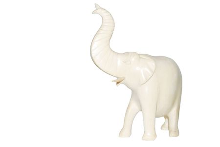 Wood elephant carving hand madeon a white isolated background isolatedの写真素材