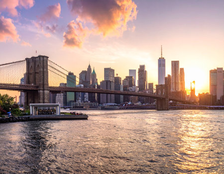 Brooklyn Bridge and Manhattan skyline at sunset, New York City.の写真素材
