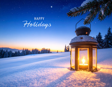 Lantern in the snow on the background of the winter landscapeの写真素材