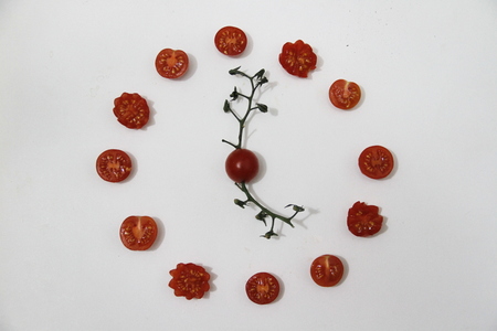 Clock of tomatoes piccadillyの写真素材