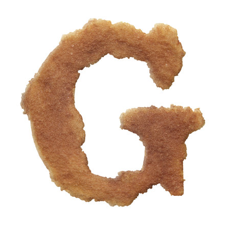 Rusty coarse baked sand letter isolated on white background.の写真素材