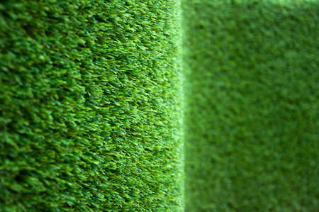 Artificial grass.Green abstract background.Lawn backdrop.の写真素材