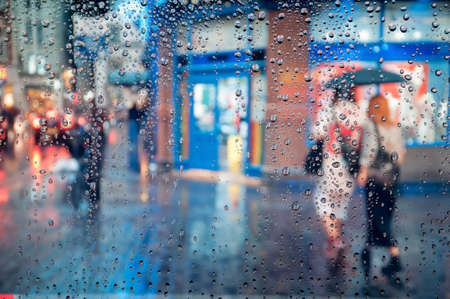 Rainy London seen through the bus window.Focus on the glass.の写真素材