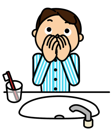 Men to check for bad breathの写真素材