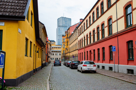 Colorful houses on Gamla Vaster area with view over Malmo Live, Malmo, Sweden