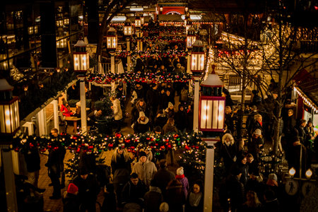People visiting the yearly christmas market on Tivoli, Copenhagen, Denmarkのeditorial素材