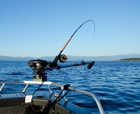Fishing Rod with down rigger on bow of boat  Salmon fishing British Columbiaの写真素材