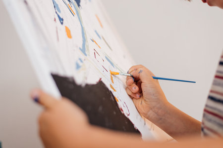 childrens hands draw a picture by numbersの写真素材