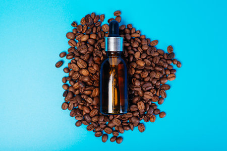 Essential oil with coffee beans. Essentialoil for menの写真素材
