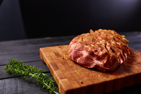 Meat with spices ready for baking in the oven. Cooking meatの写真素材