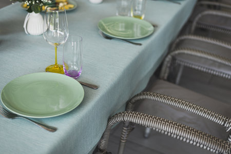 Simple table setting on green background