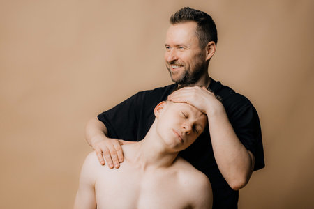 Doctor physiotherapist doing healing treatment on mans, treatment, medical doctor,.office syndrome