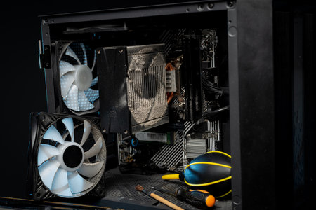 Close-up of a PC cooling system, a dirty radiator from a computer