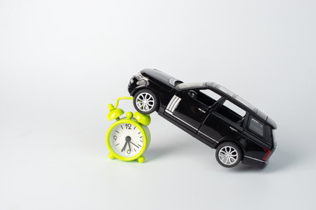car insurance. black toy car isolated