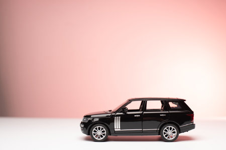 car insurance. black toy car isolatedの写真素材